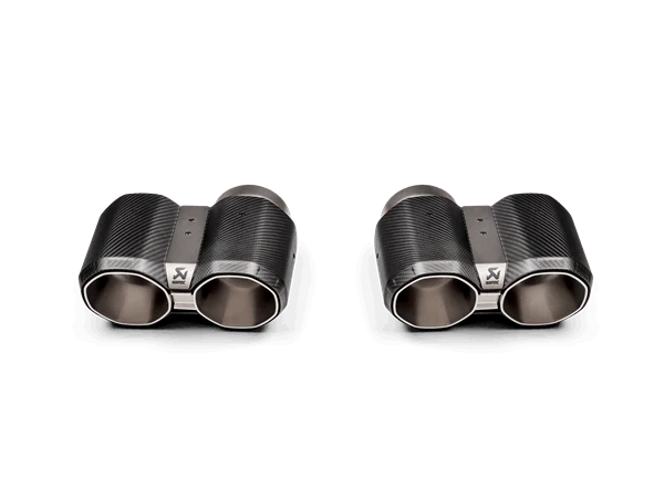 The image shows 4 Akrapovic Octagonal Carbon Tail Pipes for BMW G8X model M3s and M4s